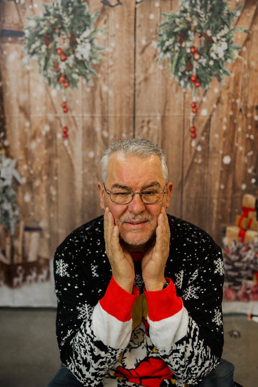 Rich posing in a festive holiday sweater